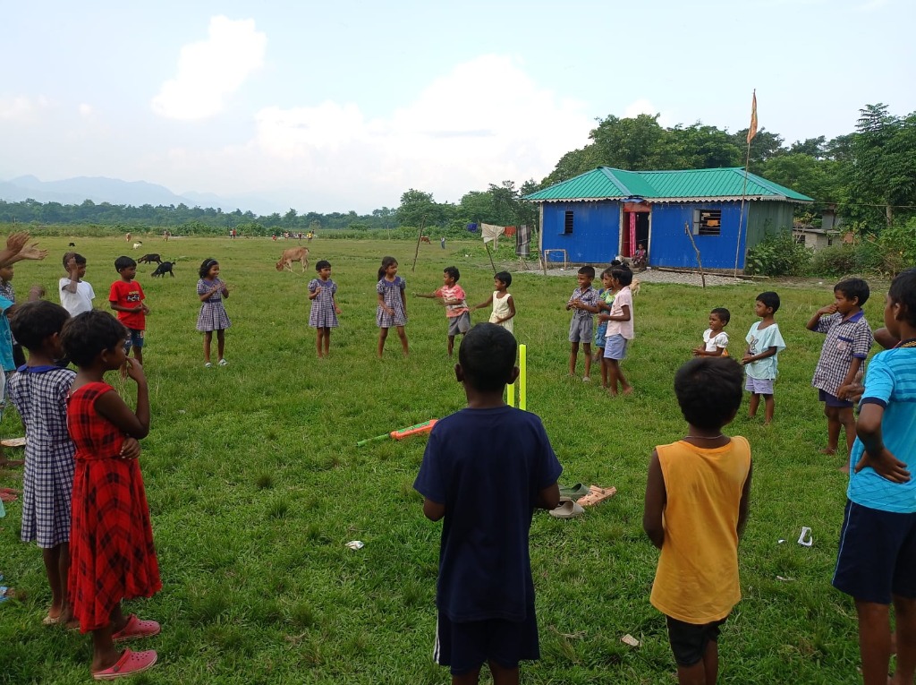 Youth boys practicing football on a rural ground